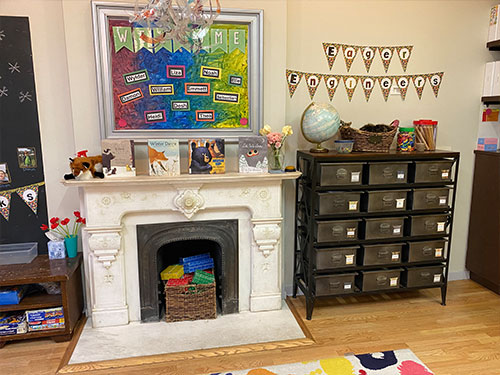 Photo of Urban Child Academy's Gold Coast two's and three's room with play bins and mantle