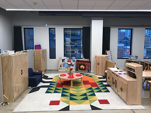 Photo of Urban Child Academy's River North two's and three's room with and play area